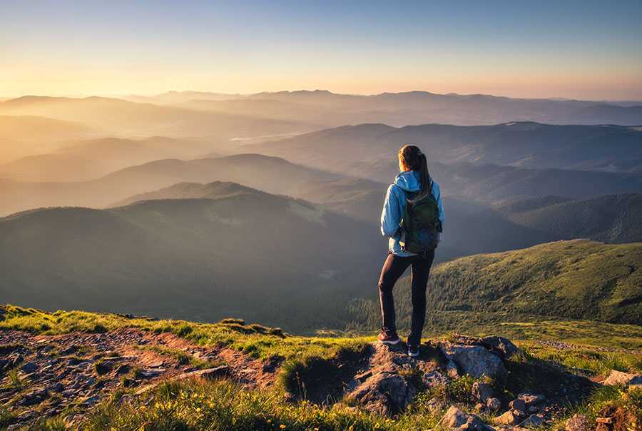 A person goes hiking in North Carolina, the state where our heroin drug rehab is located.