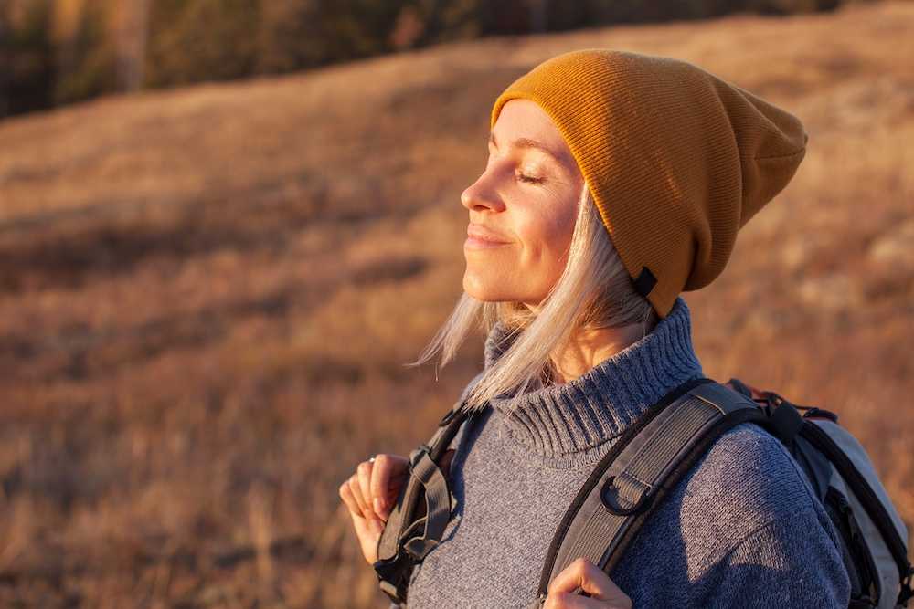 A woman goes hiking.