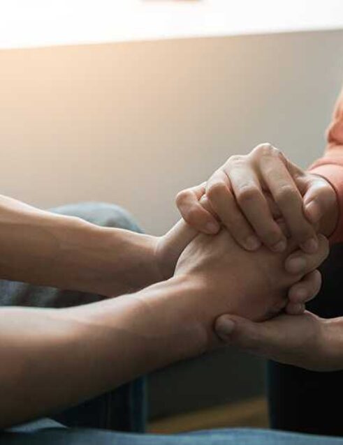 A person supports their loved one in addiction recovery.