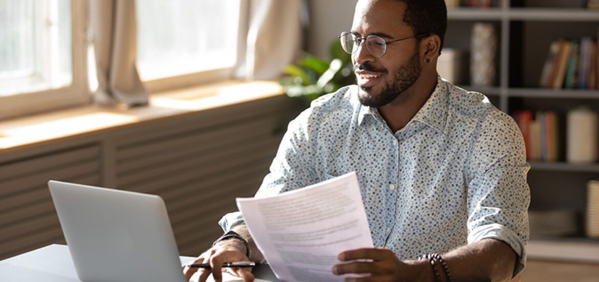 A man researches insurance coverage for alcohol rehab.