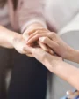 A person helps a loved one who has relapsed.