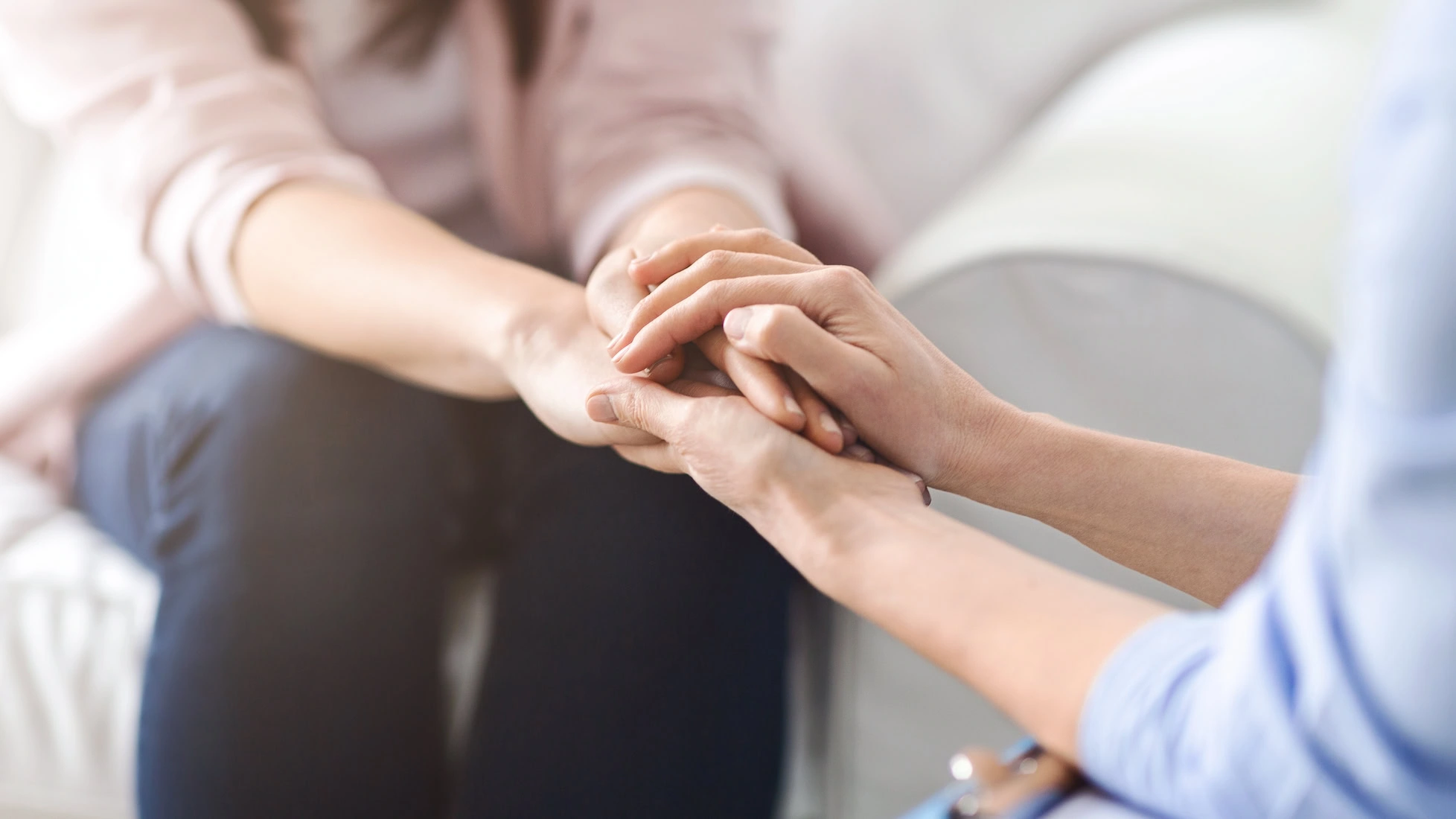 A person helps a loved one who has relapsed.