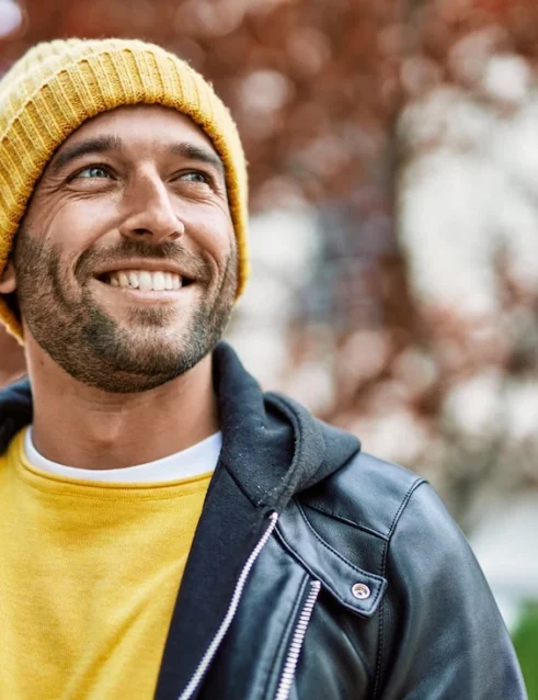 A man is happy in early sobriety.